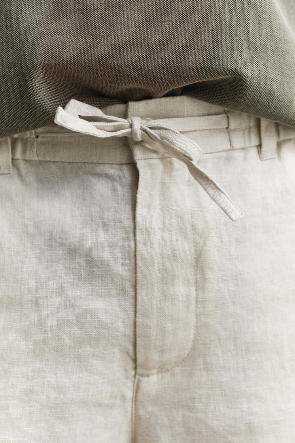 MODEL WEARING Linen Shorts
