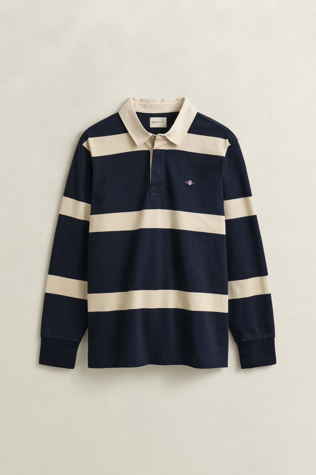 EVENING BLUE, STRIPED RUGGER, FLAT-LAY BY GANT AU.