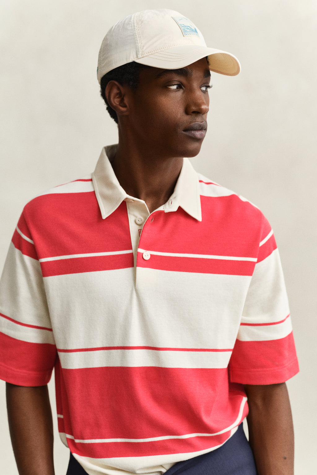 MODEL WEARING STRIPED SS RUGGER
