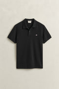 BLACK, SLIM SHIELD SS PIQUE POLO, FLAT-LAY BY GANT AU.
