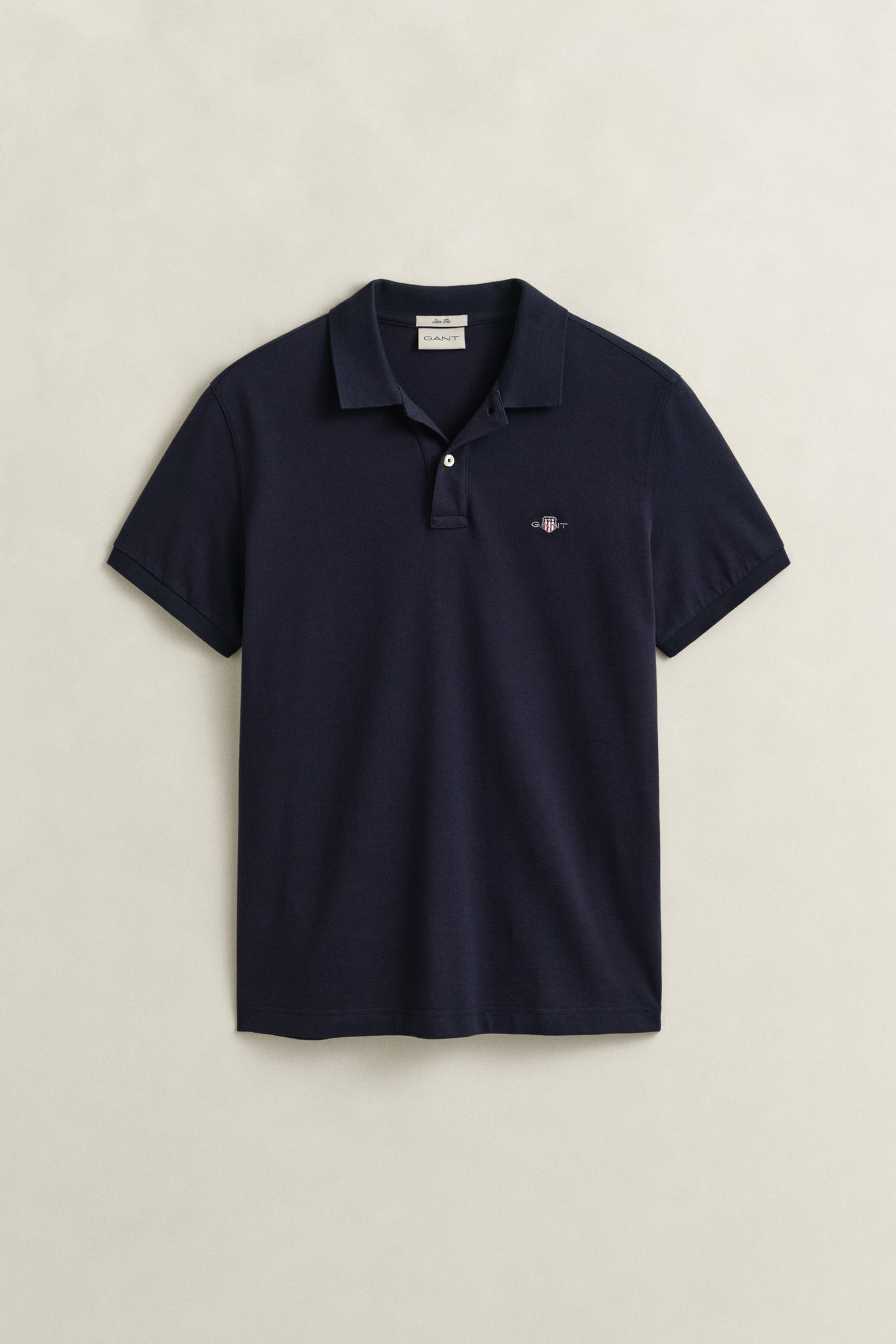 EVENING BLUE, SLIM SHIELD SS PIQUE POLO, FLAT-LAY BY GANT AU.