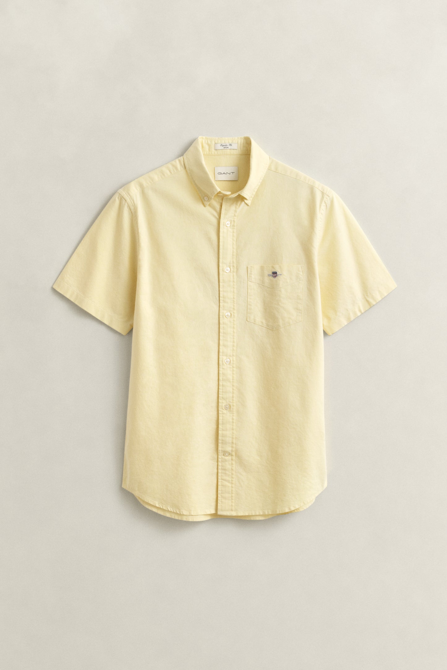 LIGHT MUSTARD YELLOW, REG CLASSIC OXFORD SS SHIRT, FLAT-LAY BY GANT AU.