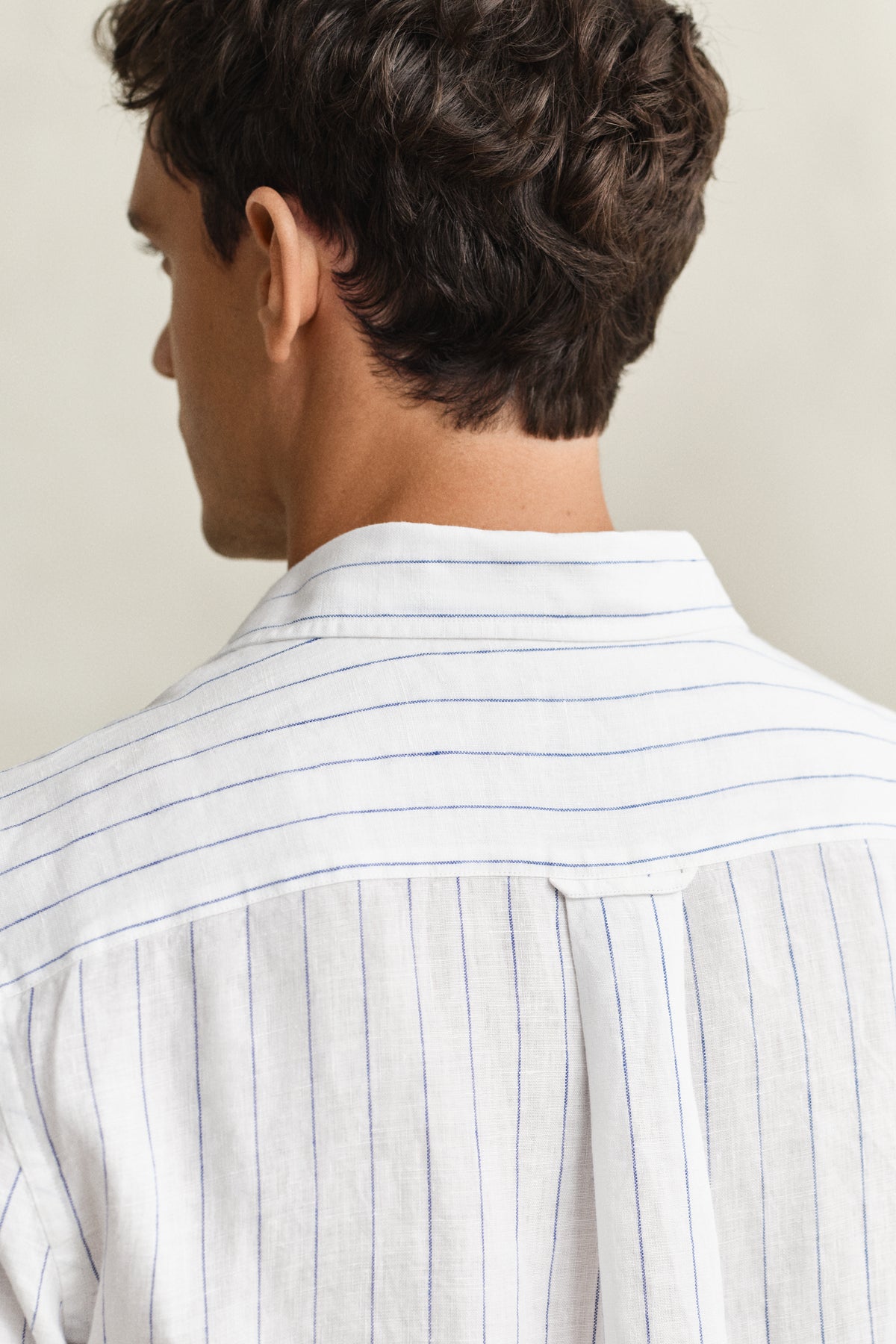 MODEL WEARING REG LINEN STRIPE SHIRT