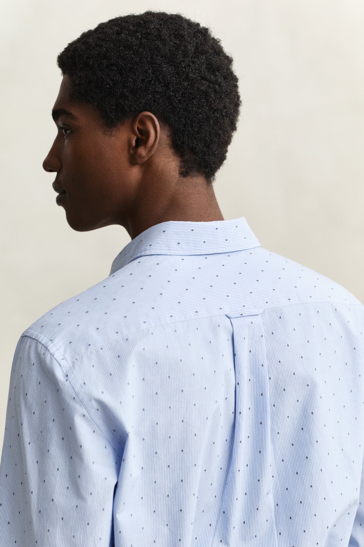 MODEL WEARING REG FIL COUPE SHIRT