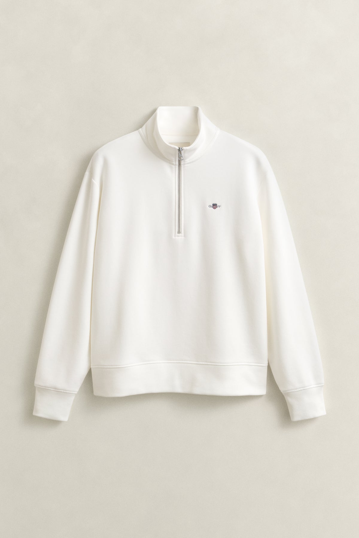 EGGSHELL, SHIELD HALF-ZIP, FLAT-LAY BY GANT AU.