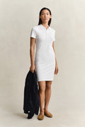 MODEL WEARING Shield Polo Dress