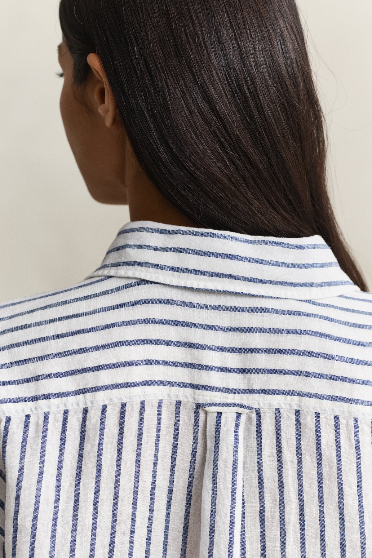 MODEL WEARING REL STRIPED LINEN LS SHIRT