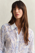 MODEL WEARING REL FLORAL PRINT CTN SILK SHIRT