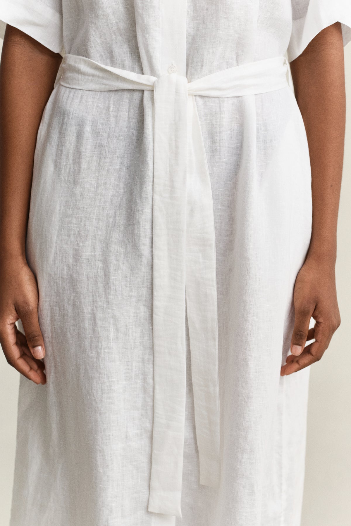 MODEL WEARING LINEN SS SHIRT DRESS