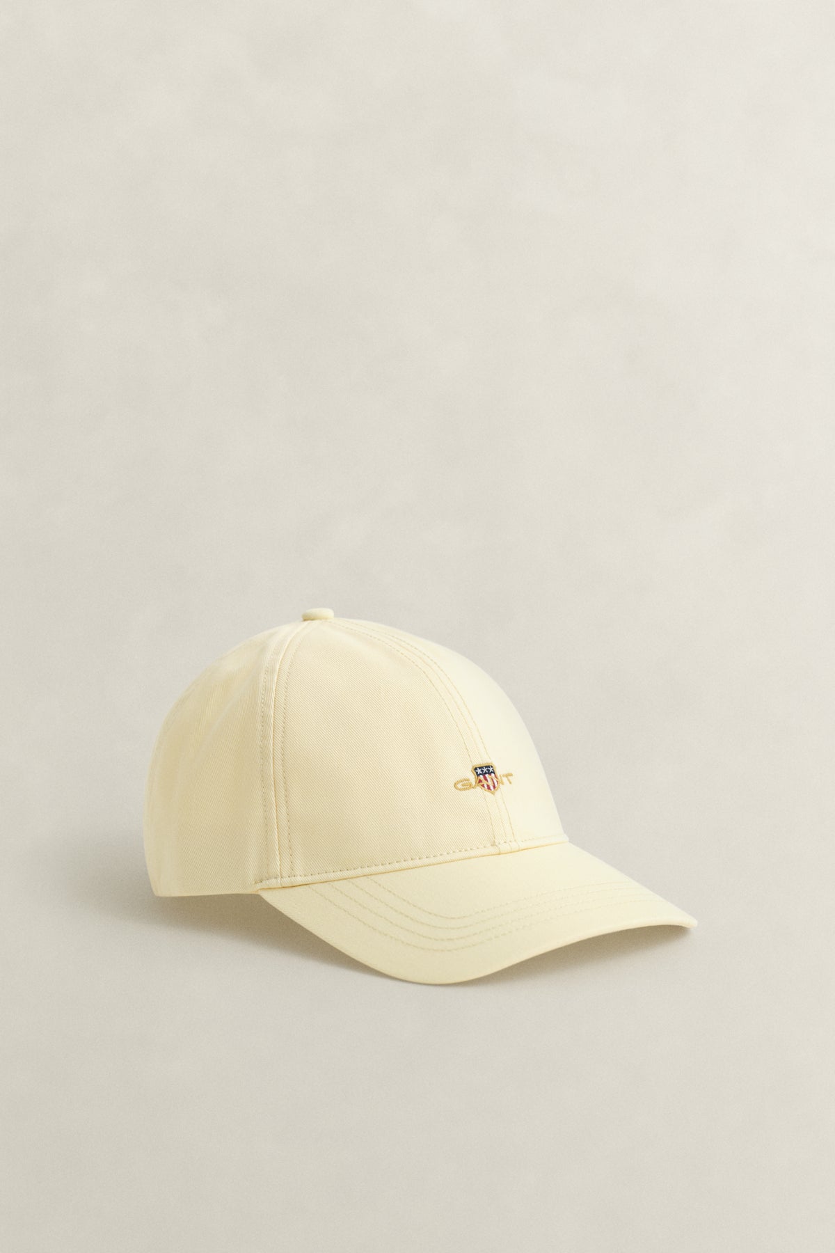 VANILLA YELLOW, SHIELD COTTON TWILL CAP, FRONT-VIEW BY GANT AU.