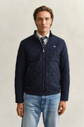 MODEL WEARING QUILTED WINDCHEATER