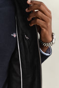 MODEL WEARING QUILTED WINDCHEATER VEST