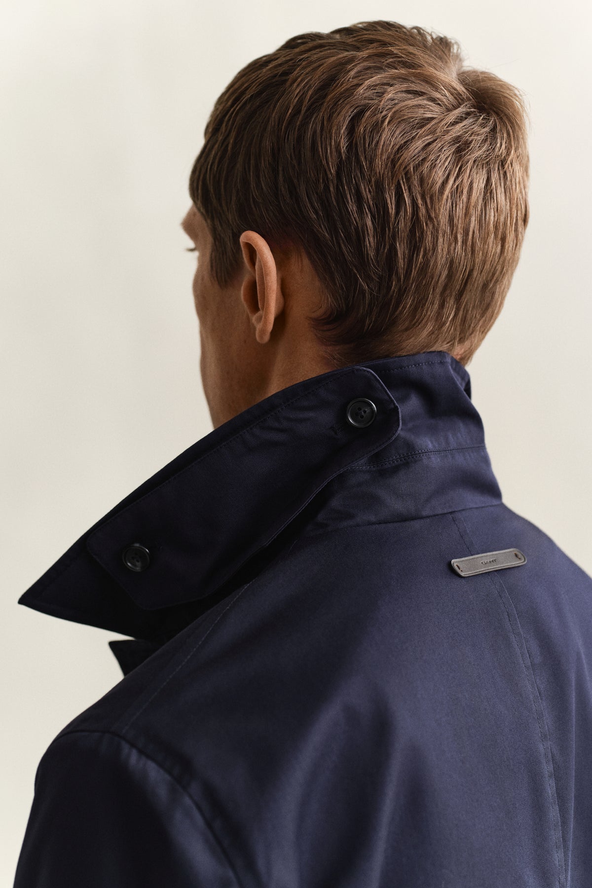MODEL WEARING COTTON BLEND CAR COAT