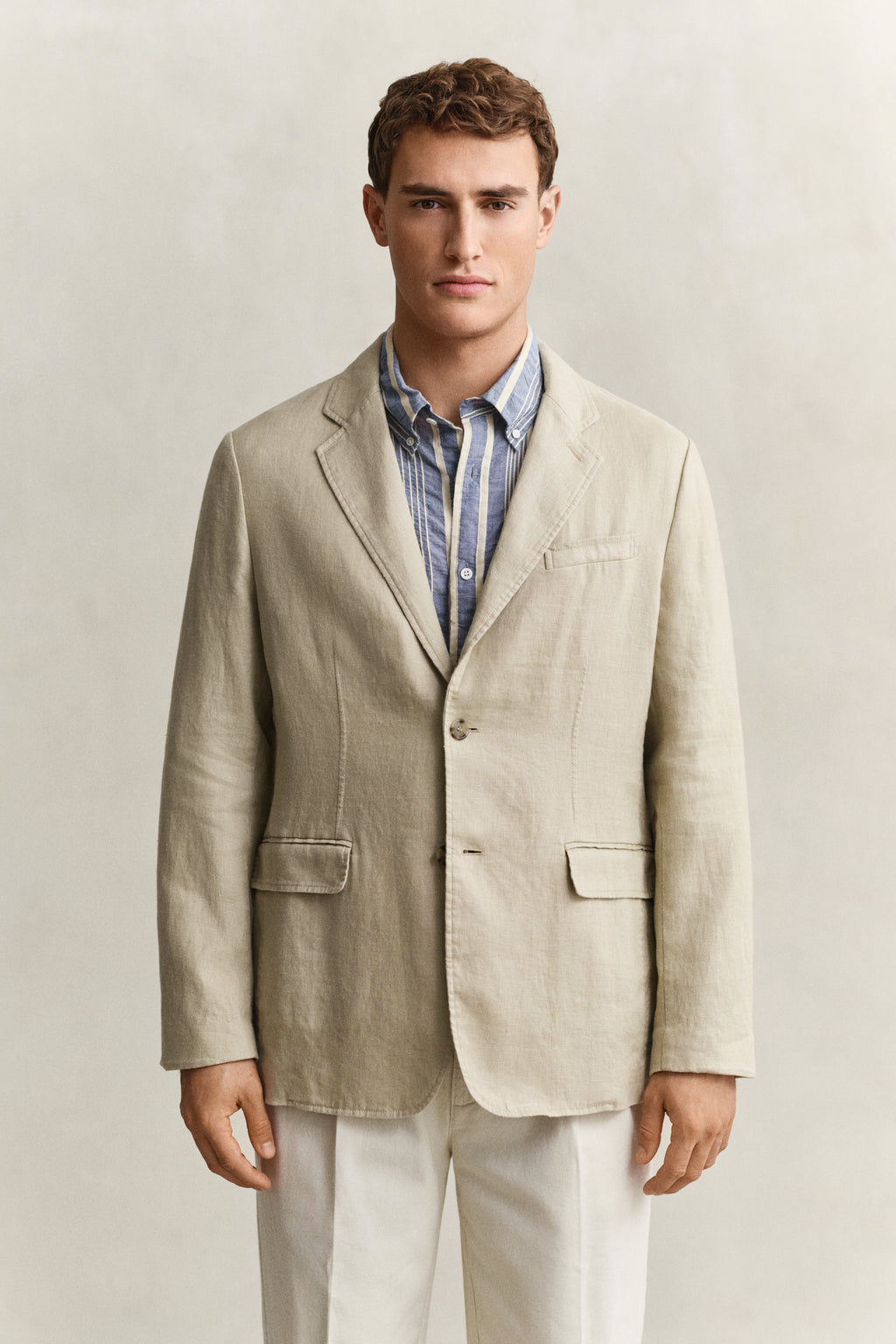 MODEL WEARING GMNT DYE LINEN BLAZER