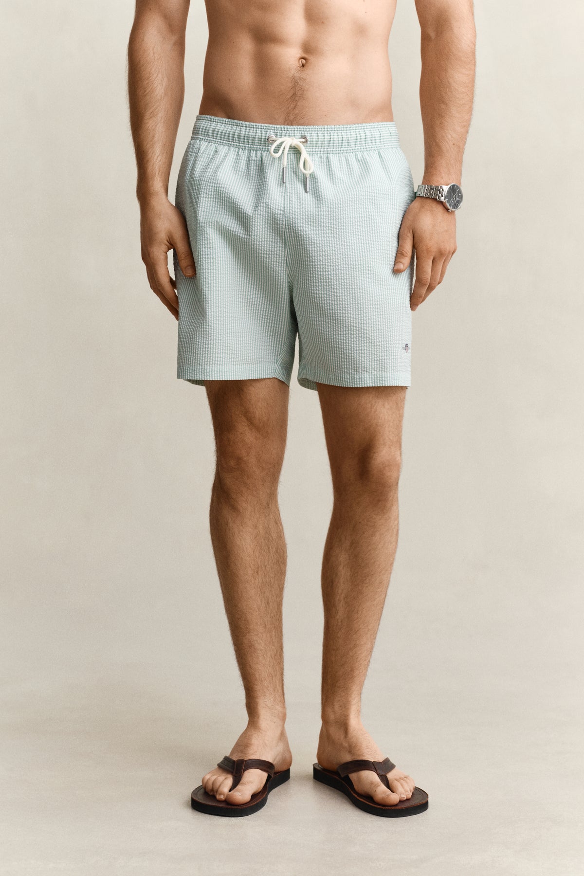 MUTED TURQUOISE, STRIPED SEERSUCKER SWIM SHORTS, CLOSE-UP BY GANT AU.