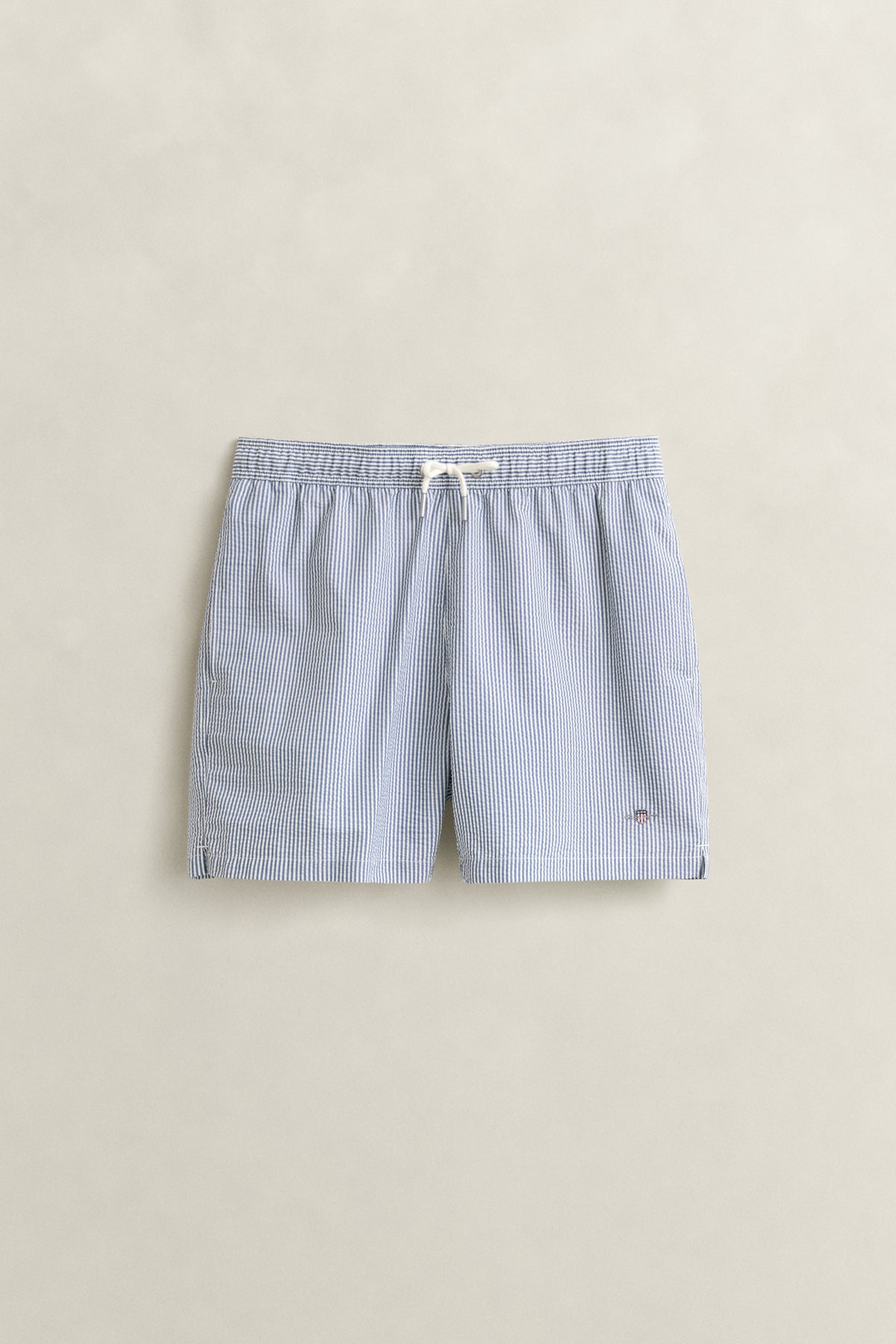 VINTAGE BLUE, STRIPED SEERSUCKER SWIM SHORTS, FRONT-VIEW BY GANT AU.