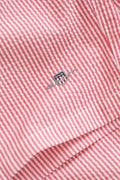 ROSE RED, STRIPED SEERSUCKER SWIM SHORTS, FLAT-LAY BY GANT AU.
