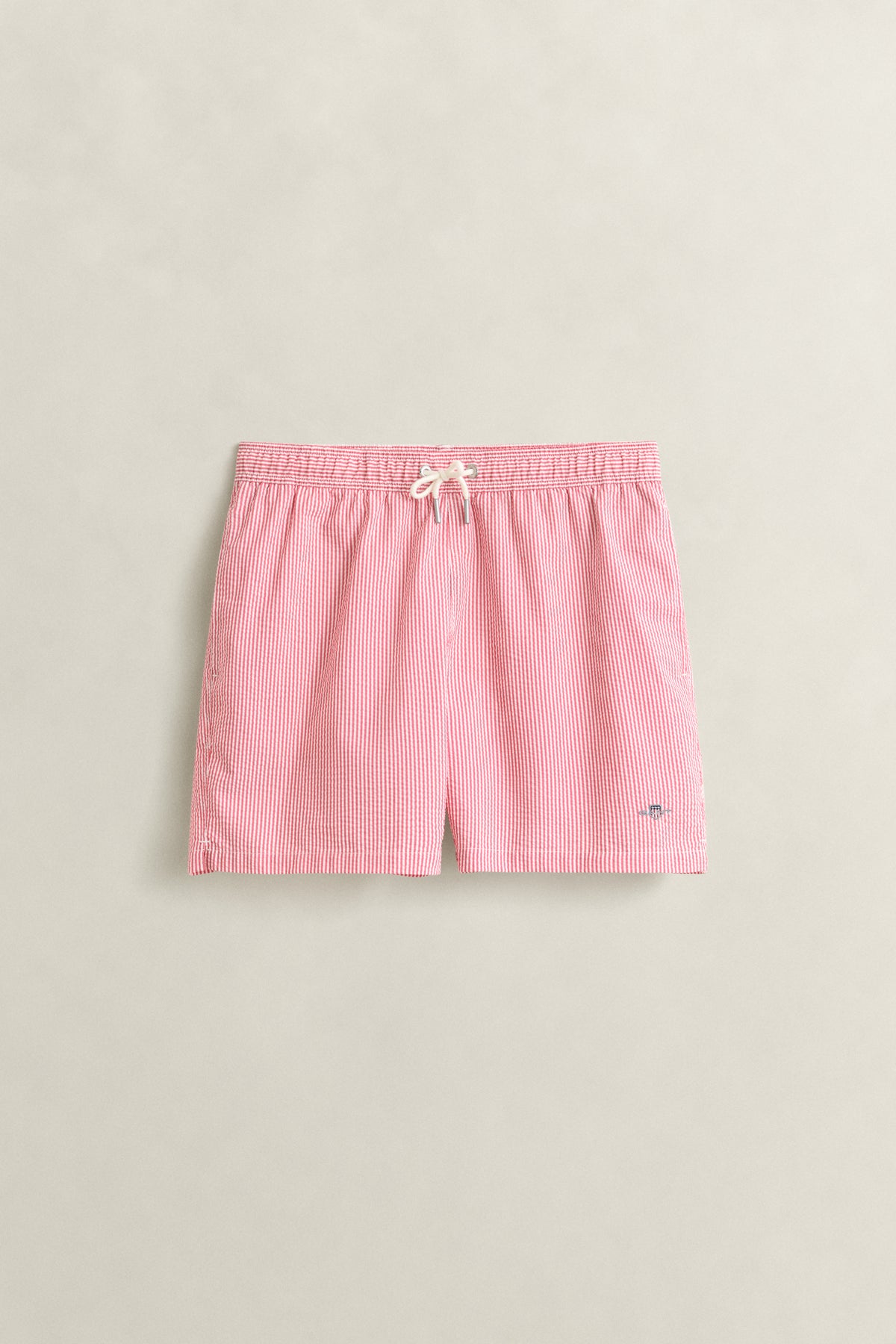 ROSE RED, STRIPED SEERSUCKER SWIM SHORTS, FRONT-VIEW BY GANT AU.