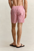 ROSE RED, STRIPED SEERSUCKER SWIM SHORTS, BACK-VIEW BY GANT AU.