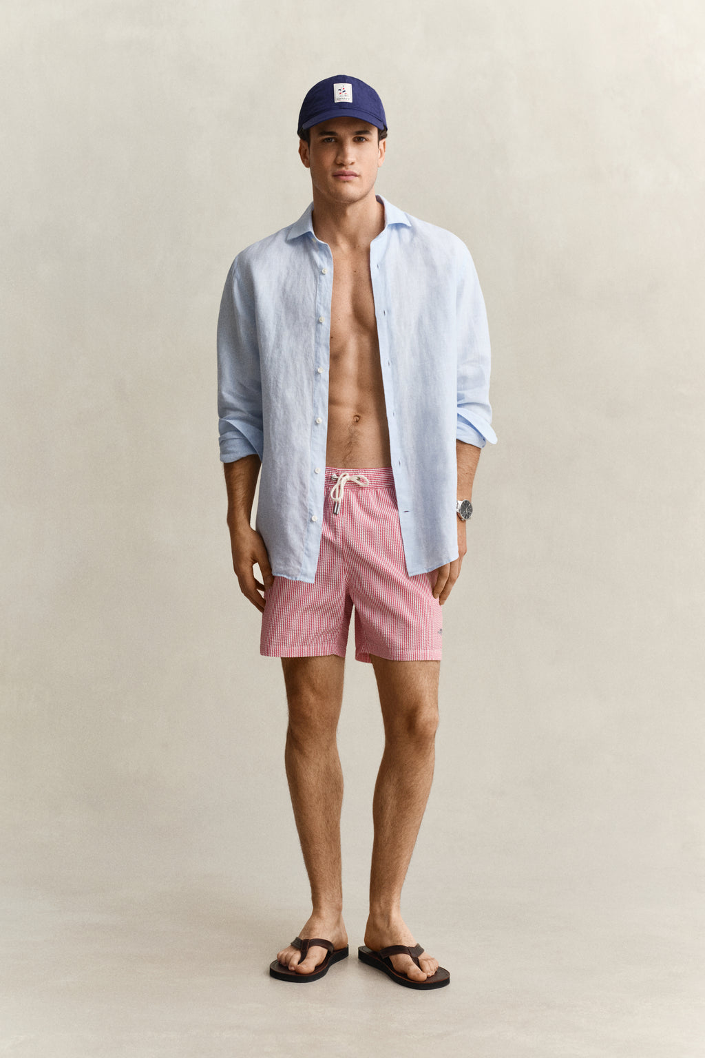 ROSE RED, STRIPED SEERSUCKER SWIM SHORTS BY GANT AU.