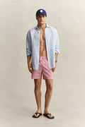 ROSE RED, STRIPED SEERSUCKER SWIM SHORTS BY GANT AU.