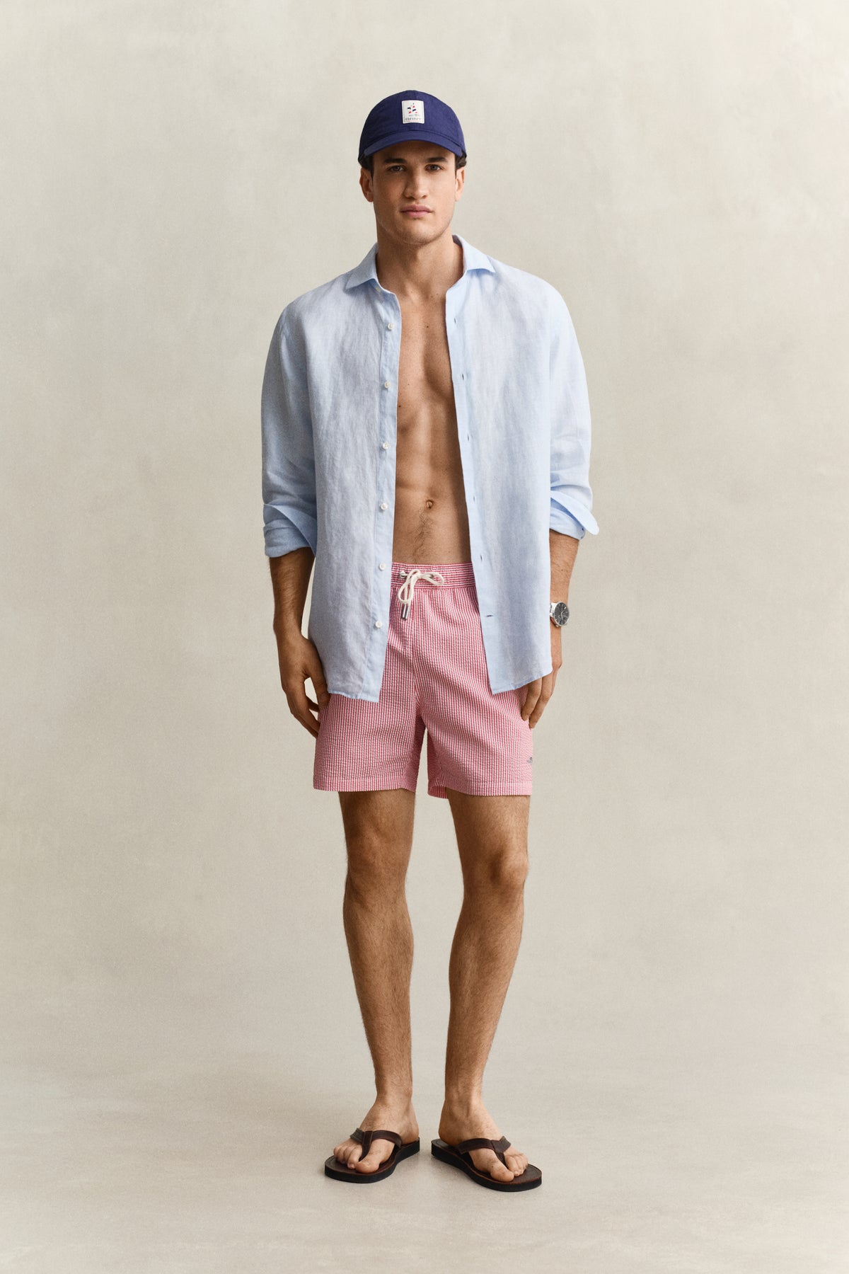ROSE RED, STRIPED SEERSUCKER SWIM SHORTS BY GANT AU.