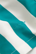 AQUA BLUE, BLOCK STRIPED SWIM SHORTS, FLAT-LAY BY GANT AU.