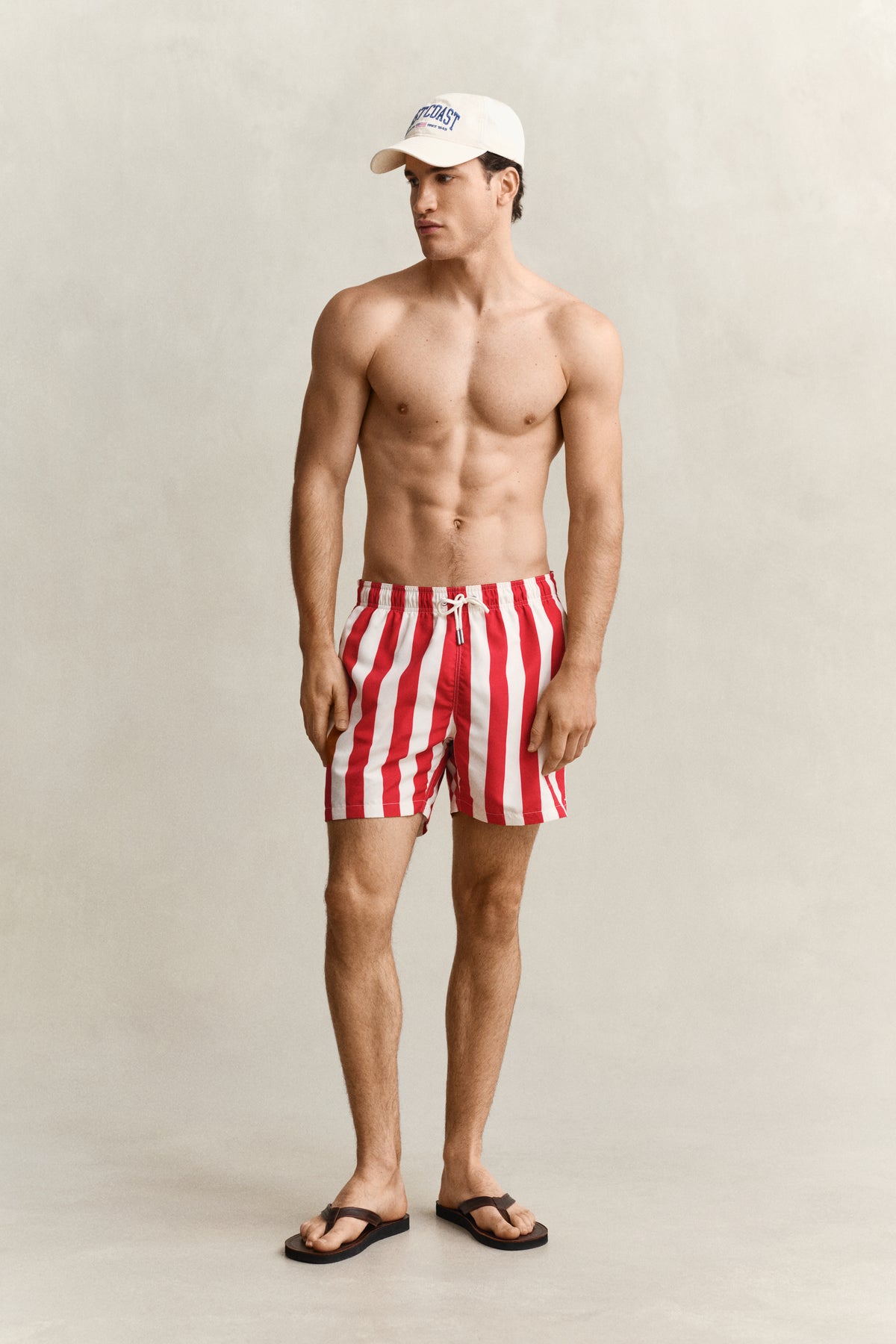 ROSE RED, BLOCK STRIPED SWIM SHORTS BY GANT AU.