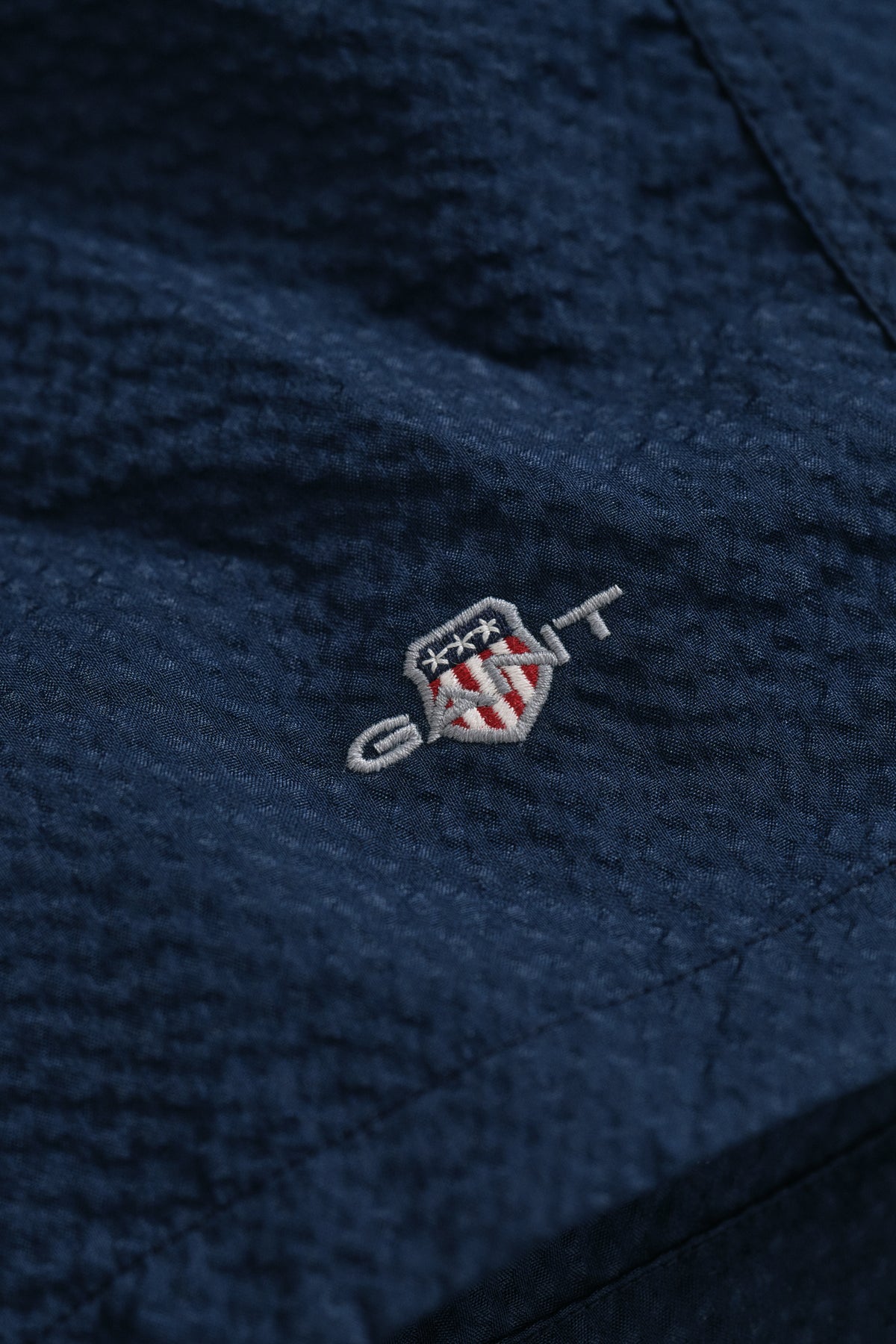 MARINE, SEERSUCKER SWIM SHORTS, FLAT-LAY BY GANT AU.