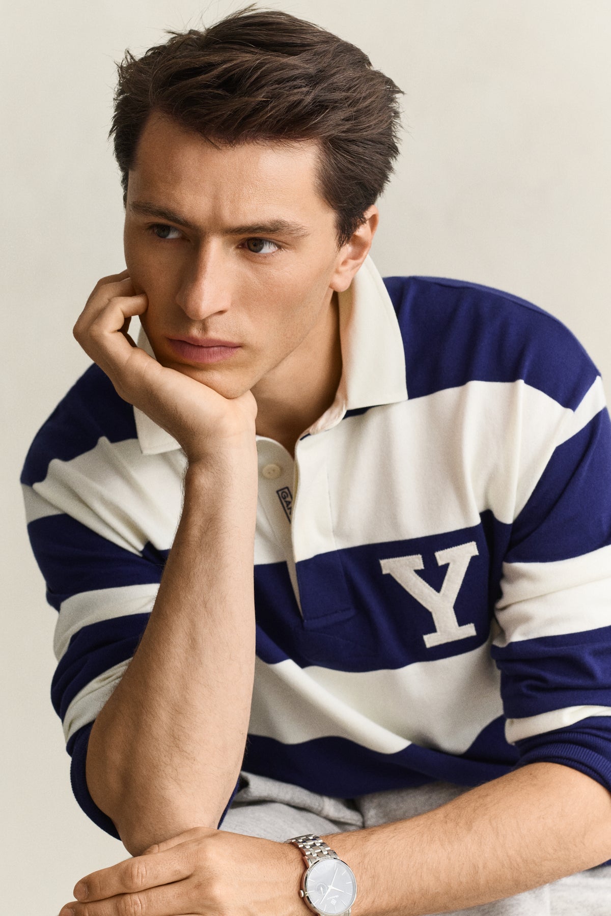 MODEL WEARING YALE STRIPED HEAVY RUGGER