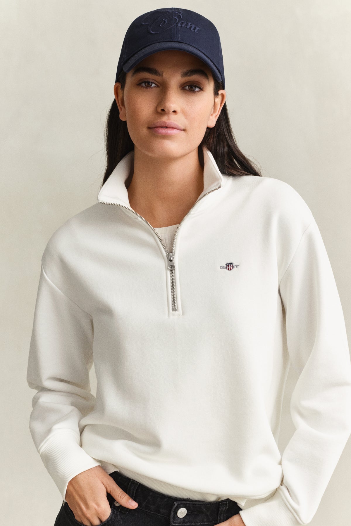 MODEL WEARING SHIELD HALF-ZIP