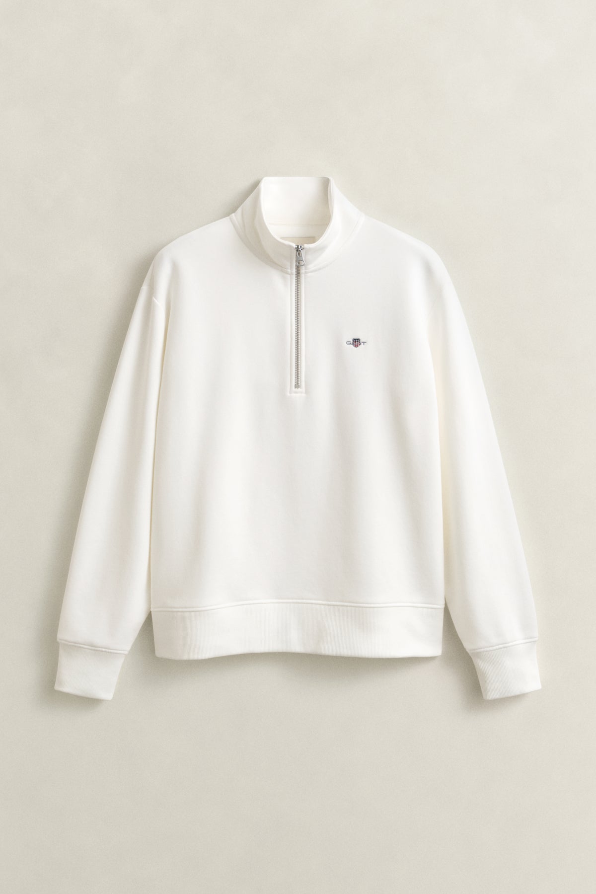 EGGSHELL, SHIELD HALF-ZIP, FLAT-LAY BY GANT AU.