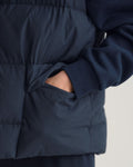 MODEL WEARING D1. PUFFER VEST