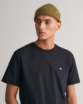 MODEL WEARING Shield T-Shirt