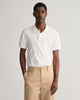 WHITE, REG SHIELD SS PIQUE POLO, FRONT-VIEW BY GANT AU.