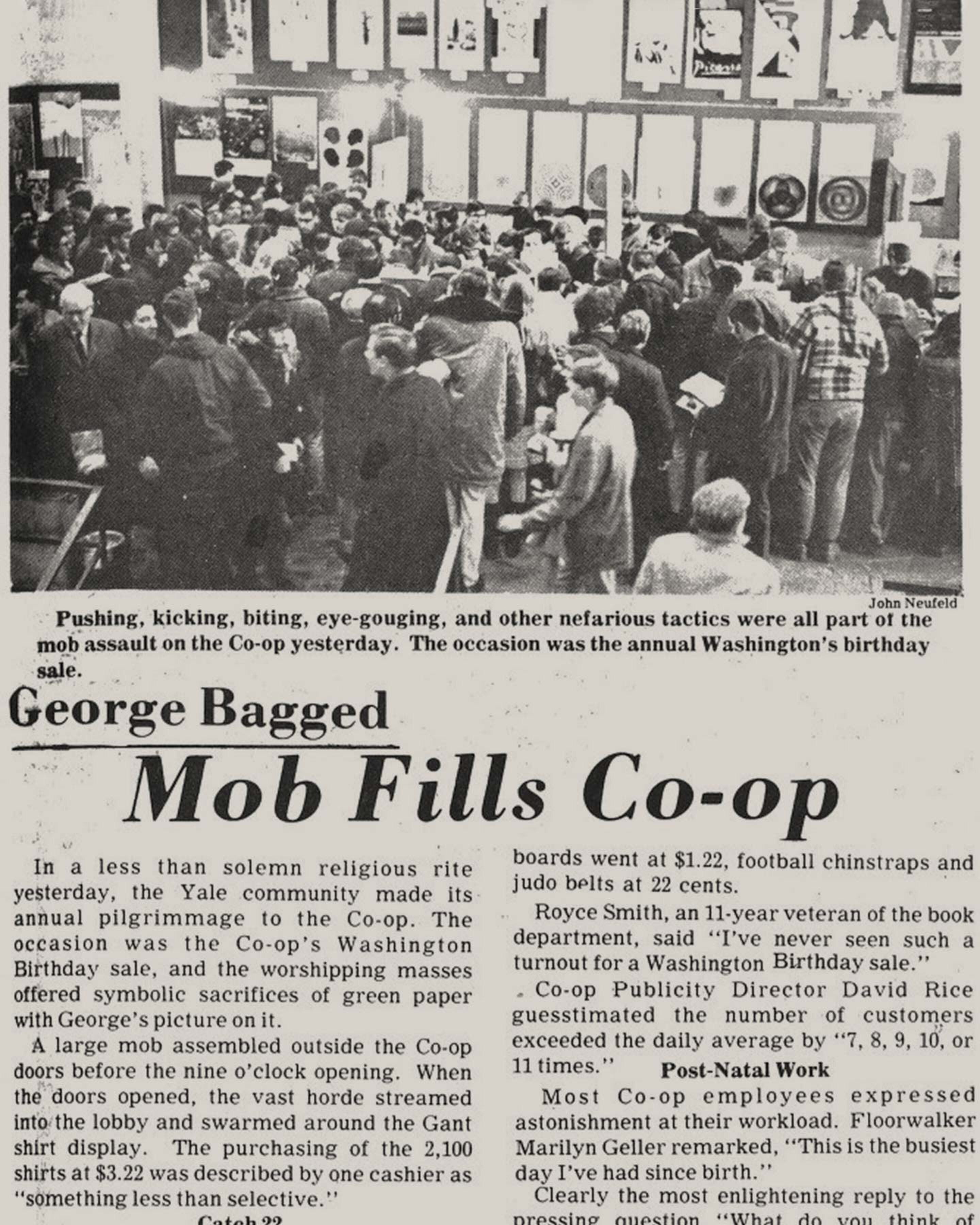 Newspaper article about a co-op during a birthday sale, with a crowd of people in the background.
